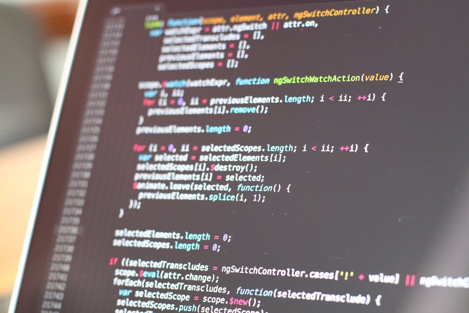 A close-up image of a computer screen displaying a programming code editor with lines of colorful JavaScript code. The code includes syntax highlighting with different colors such as blue, pink, green